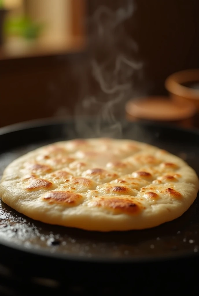 Soft and patli Roti tave par golden brown colour hoti hui in the kitchen 