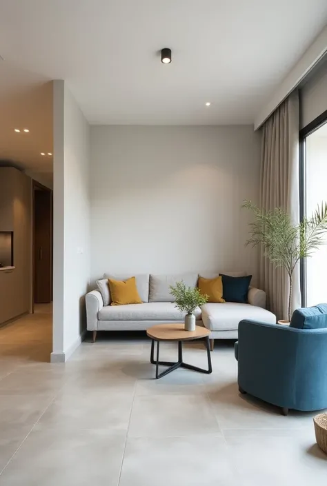 a simple apartment for the contemporary Brazilian style with those who have a low cost and want cost-benefit elements.  Floor with light gray ceramic, beige sofa and blue armchair 