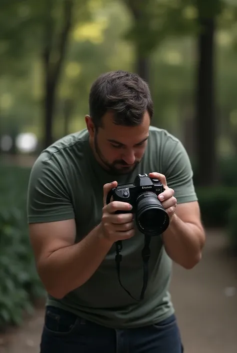 A man holding a professional camera all the photo in the shade