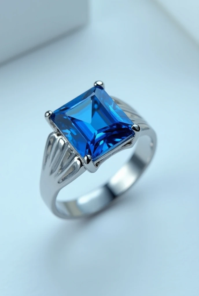 Graduation ring with blue square stone
