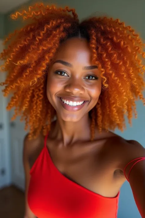 A black girl taking selfie ,  ginger hair - red - orange ,  red dress with strap on the side of her arm.