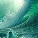 The image is emerald in color, with white tints of the sea wave, water bubbles.