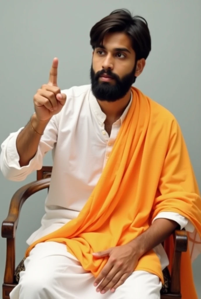 A 20-year-old male sits on a chair wearing a white kurta and an orange gamchha draped over his shoulders, symbolizing Hinduism. His shoulder-length hair is styled in a middle part, adding to his traditional appearance. He has a focused expression and point...