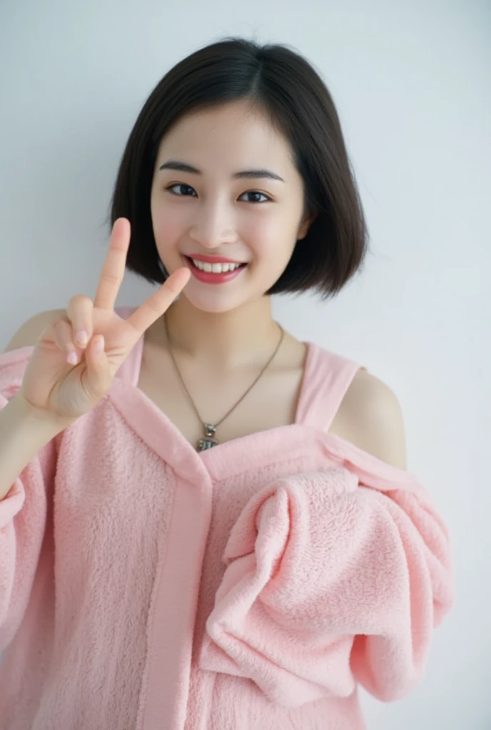 Only one woman with a cute smile wears cute, fluffy off-shoulder pajamas, makes a big heart shape with both hands, and poses them in front of her chest, View above collarbone、The background is a monotone 

