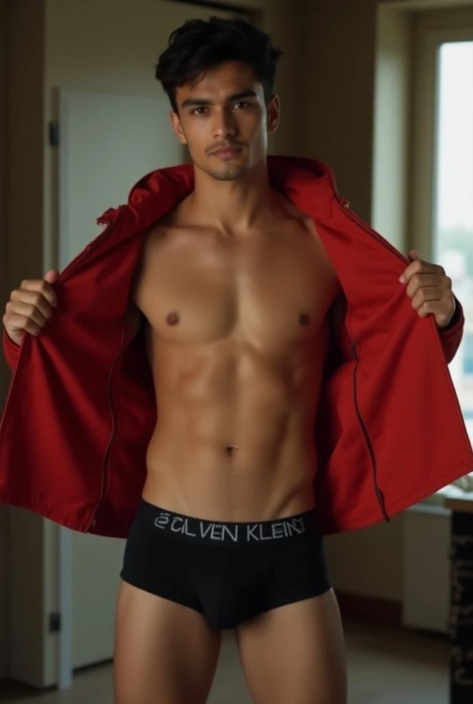 A 20 years old Indian boy were red  houdi jacket and were big  size  black trunk underwear only black trunk underwear only 
And Calvin Klein company barding on black trunk underwear in home   standing position looking very handsome removing his houdi and  ...