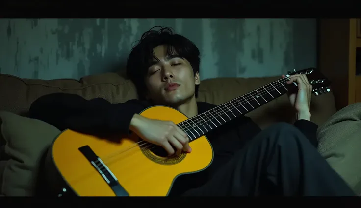 A handsome Korean guy was sleeping, huddled on the sofa, he was holding a guitar with a yellow soundboard, he was wearing a long-sleeved black shirt, he had a handsome appearance, his eyebrows were wrinkled with painful expressions, scene takes place in an...