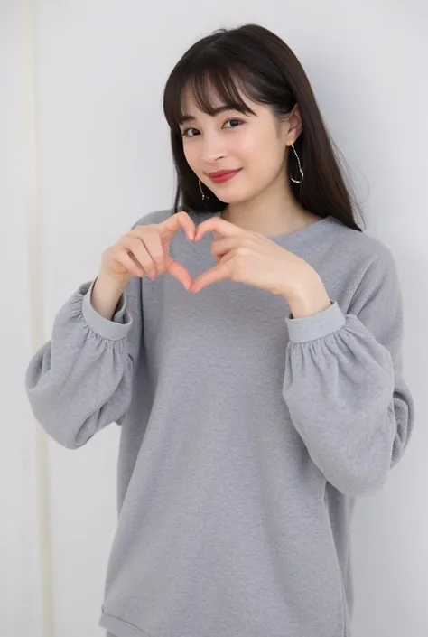 Only one woman with a cute smile wears cute, fluffy off-shoulder pajamas, makes a big heart shape with both hands, and poses them in front of her chest, View above collarbone、The background is a monotone 

