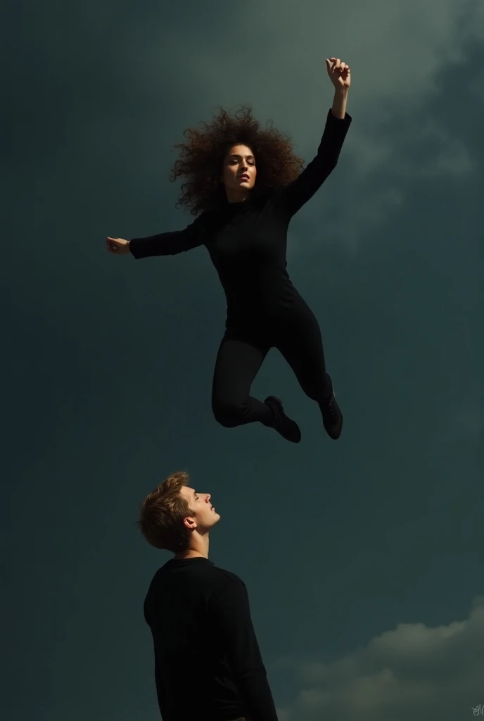 A young brunette flying in the sky all black ,  euma with curly hair and a blond young man on the ground looking at the young brunette 