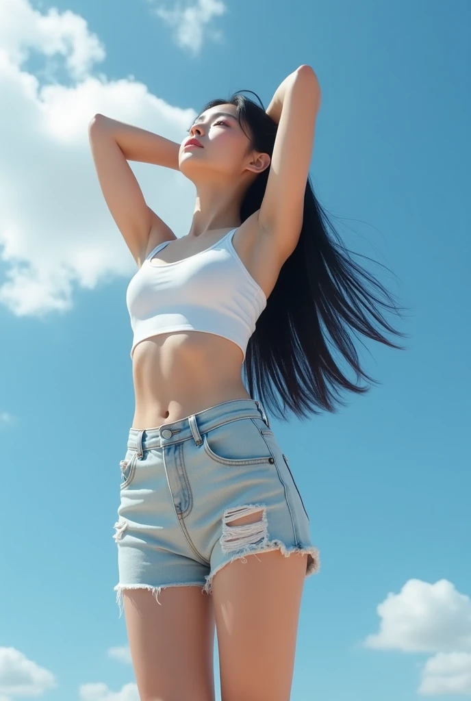 Very low angle shot of a beautiful Japanese-Korean woman with long black hair posing outdoors against a clear blue sky with scattered white clouds. She is wearing a white crop top that reveals her chest and six-pack abs, and light-colored ripped denim shor...