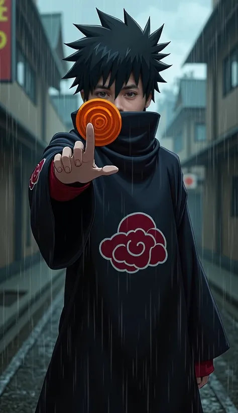 Cover portrait of a man imitating the character Tobi Akatsuki from the anime series Naruto Shippuden, Tobis costume is a black Akatsuki robe with a cloud motif with the Akatsuki logo in white and red, he is standing in the rain, his head is turned to the s...