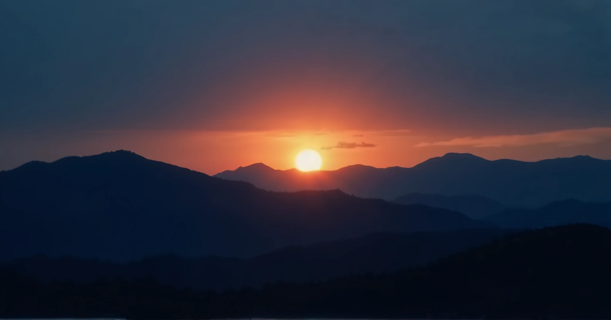 Dusk. The sun is about to set below the mountains. The mountains are not steep, but gentle Japanese mountains. The mountains are already dark. The edge of the mountain is bright. The sky above is already dark.