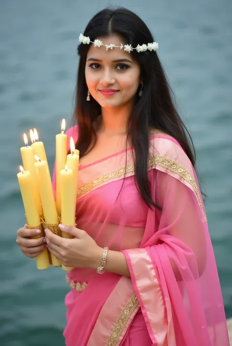  a model of a Asian woman, dressed in a pink saree, adorned with gold embroidery, is holding a bouquet of lit candles in her hands. The womans hair is long and cascades over her shoulders. She is adorned with a flower headband, earrings, and a bracelet. Th...