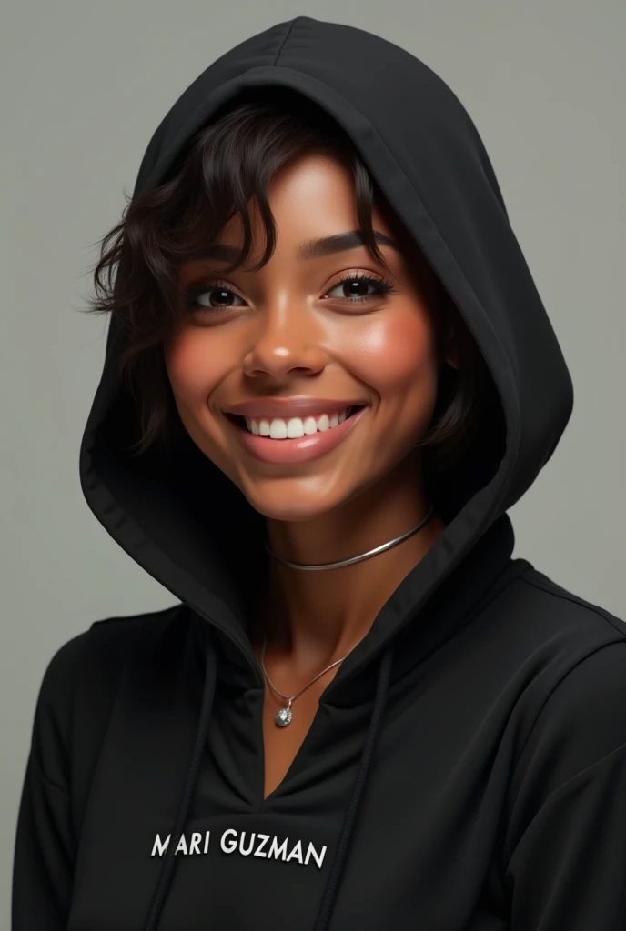 An adult lady with tanned mulatto skin, short black hair with a black hood with a black hood with a name in front of her on the hood, MARI GUZMÁN, with a smile.  😀