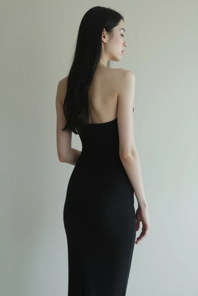 Thin woman, light skin, long straight hair,  black dress  