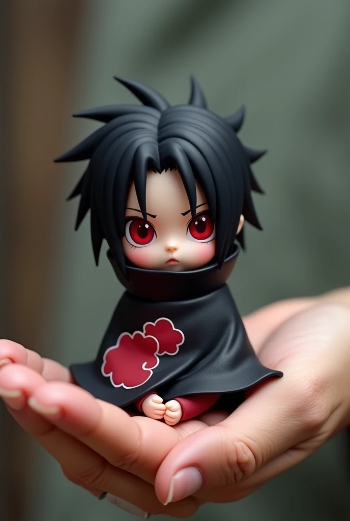 Create a miniature baby dressed as Itachi Uchiha with black hair and red eyes on top of a human hand.