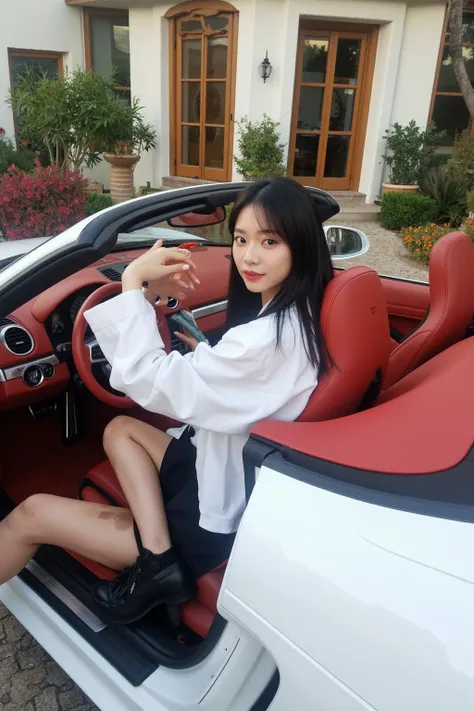 A 36-year-old female CEO takes a side selfie in the drivers seat of a white convertible Porsche 718 in front of a luxury villa in Los Angeles。Red interior 。I saw a red steering wheel 。Oriental woman with round face, full chest, long black hair 。Light makeu...