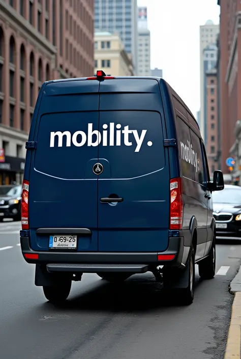 A navy blue van that says "mobility"
