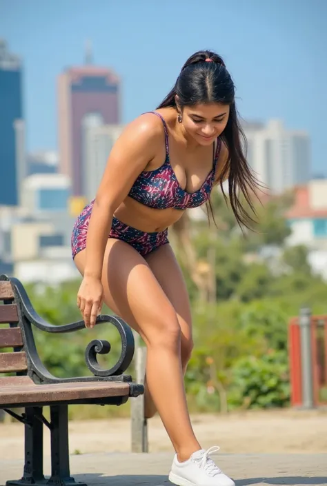 A fit, curvy, and beautiful female Indian athlete performs explosive step-ups on a park bench, with a vibrant city skyline in the background. She wears decorated running shorts with side-cut, showcasing her athletic form. The camera captures her powerful m...