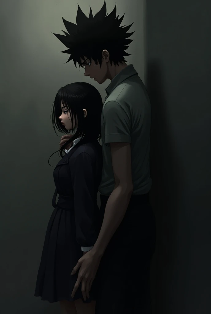 Boy with tall black hair cornering a girl with long black hair against a wall 