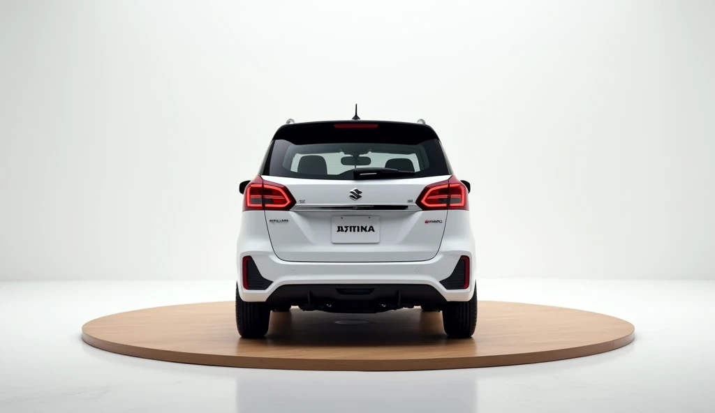 "A 2025 Suzuki Ertiga car in white color with a black roof, viewed from a full rear angle in an all-white, modern showroom. The car is displayed on a circular wooden platform with a light wood tone. The rear lights, bumper, and the license plate with SUZUK...