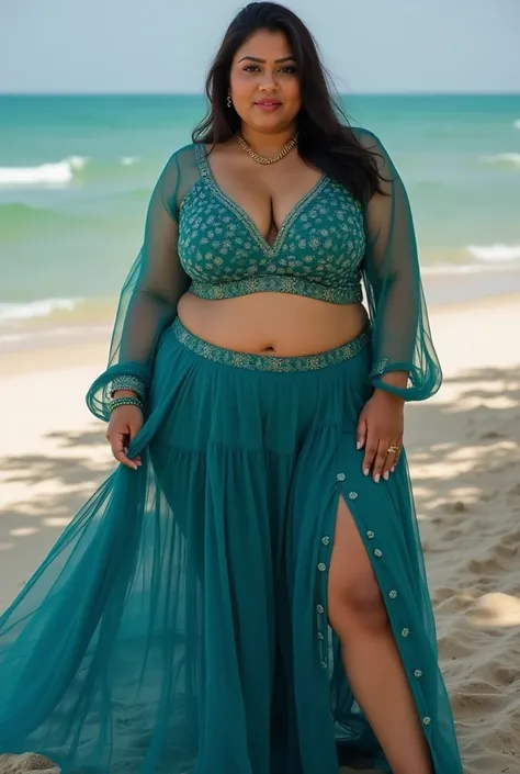 close up full body of look at viewer Chhattisgarhi sexy chubby aunty at age of 20 in Rajasthani transparent sexy peacock-blue net-blouse and long transparent net-skirt with and showing her sexy full body structure in her beach