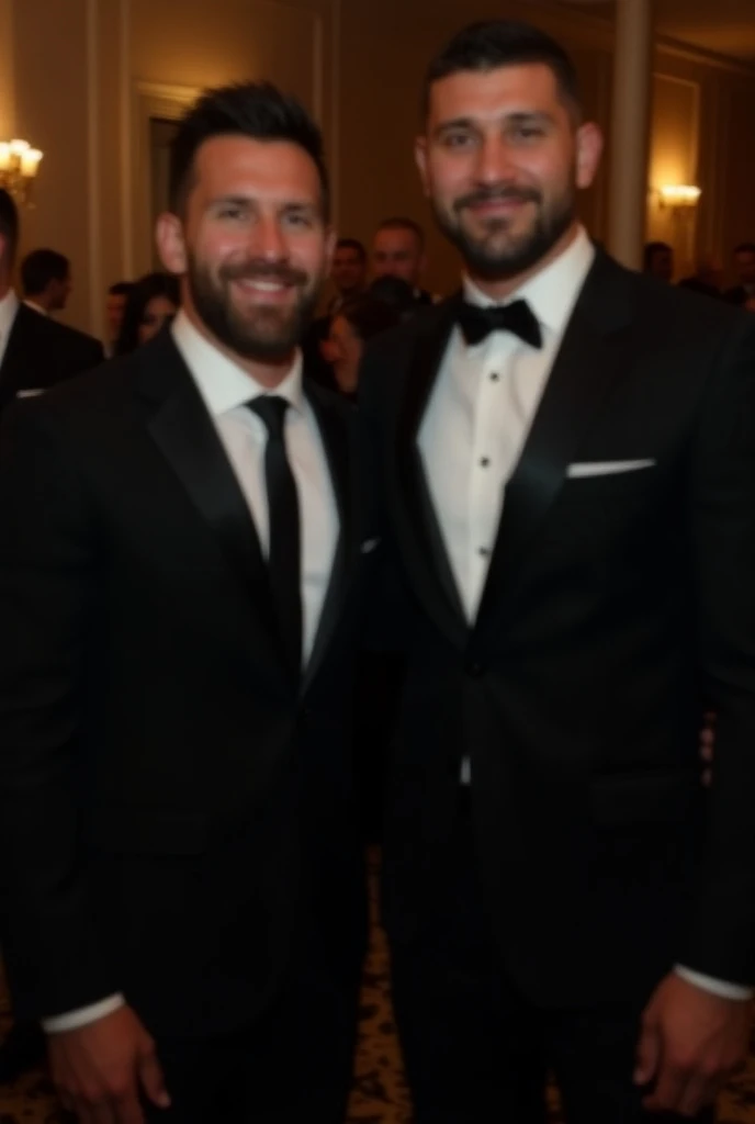 "At a formal gala event, Lionel Messi and Khabib Nurmagomedov stand together dressed in elegant black suits, exuding confidence and camaraderie. The atmosphere is warm and sophisticated, with dim lighting and a backdrop of well-dressed attendees. Both appe...