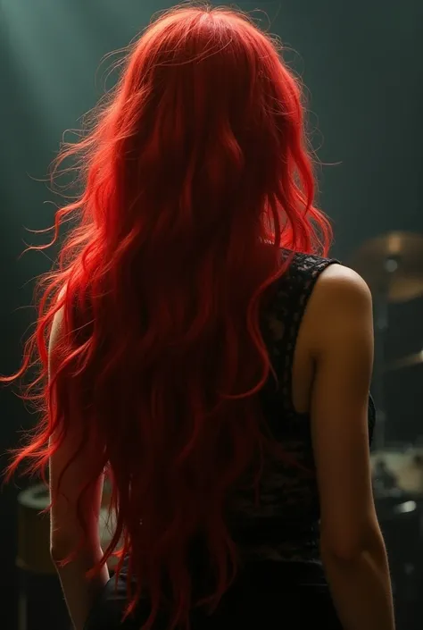 She is the bass player in my moms band with long fire dead hair cascading down her back like a mermaid
