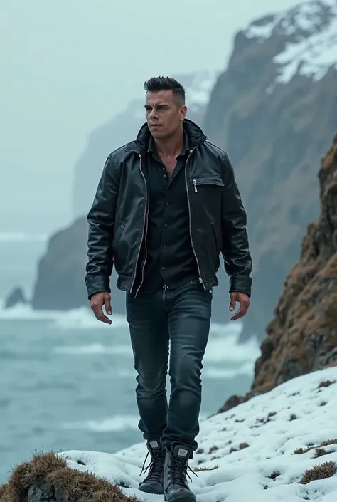 Badass magnificent and Regal guy wearing a leather bomber jacket and black jeans, walking around a cliff during the a cold winter day near a beach