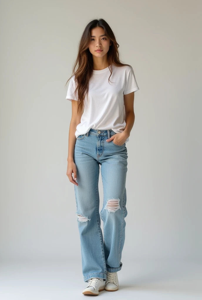 Full body image of a hot 20 year old girl wearing light wash straight legged jeans that are slightly ripped. She is also wearing a tucked t shirt 