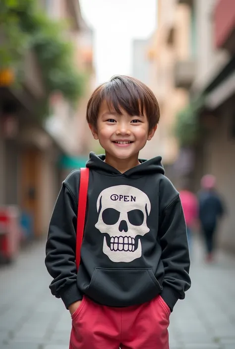 Photography standing chubby boy nine year old smiling , light brown hair with bangs, hoddie written "KEY LOVERS". wearing a nguyen hoodie with a skull design and light red and pink long short, carrying a red shoulder bag. The background features an urban s...