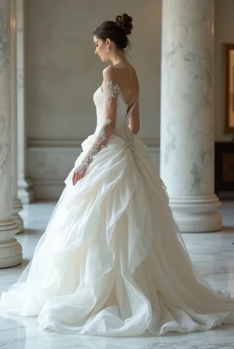 Create a white stone ball gown .  The dress must represent a swan closing its wings that must be reflected in that ball gown 