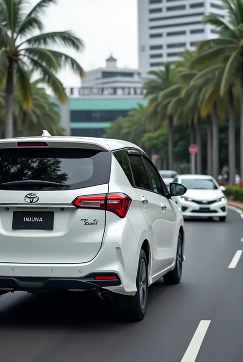 a photo of a white toyota new avanza 2023 car seen from the back is running from aljuaini office towards the Indonesian immigration office is seen with the IMMIGRATION sign
