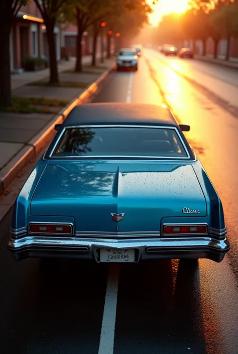 The rear of a classic 1970s American car, metallic blue in color, parked next to the sidewalk, in late afternoon lighting, with reflections of the sunset. The car is parked at 90 degrees, perpendicular to the curb and the viewing angle is from above. Close...