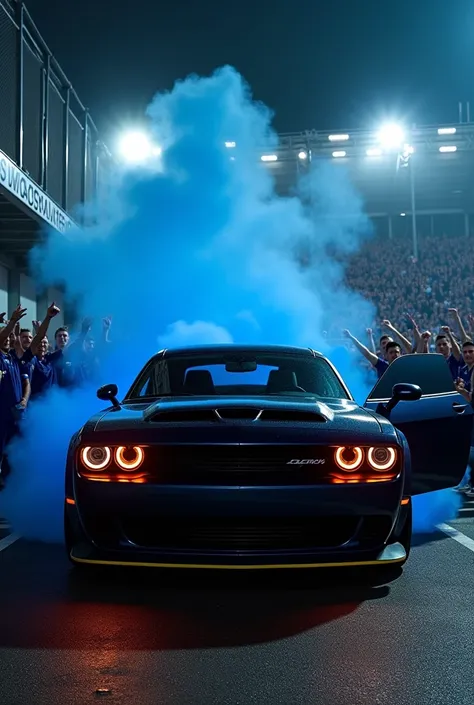 Dodge Demon in black color with litmus parked in front of one at the doors of the stadium at night ,  there are Chelsea fans around the car with smoke blue signs and fences and two locks next to the door of the car that is opening