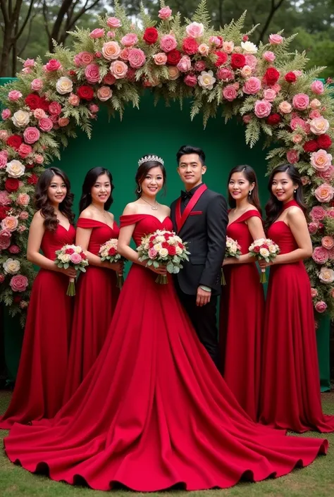  beautiful Indonesians , a 22 year old woman wearing The wedding dress is complete in red color along with her accessories and wear a red crown with hair in the booth and at the curly ends her and megangs big bouquet of flowers . and next to him there is a...