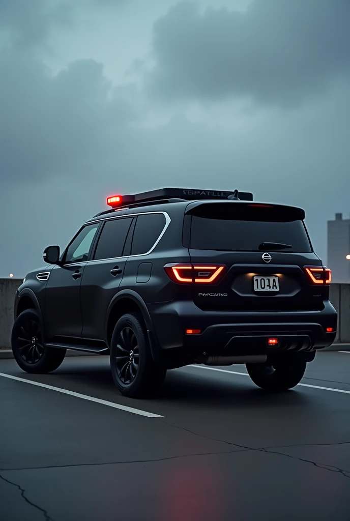  A black Nissan Patrol 2022 car with black windows parked on the spot, with beacon lights on top of the car, one of the lights on and one off, and the weather in the evening being cloudy, and the license plate number 10-AA-