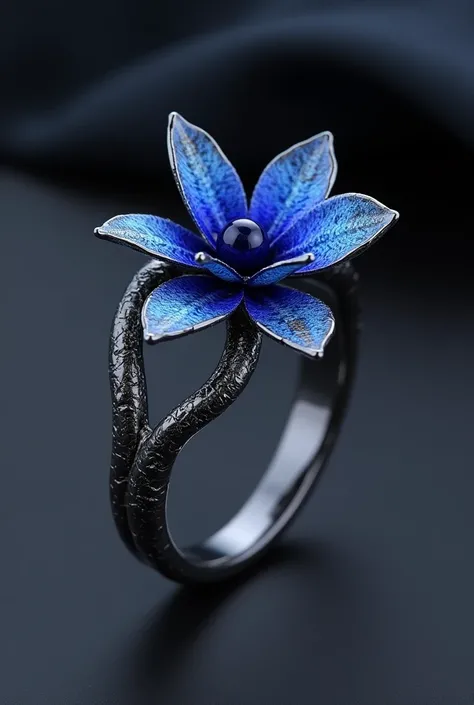 Ring for women in black or silver steel ,  the design should be like a creeper with an orchid in which a lapis lazuli can be placed in the center