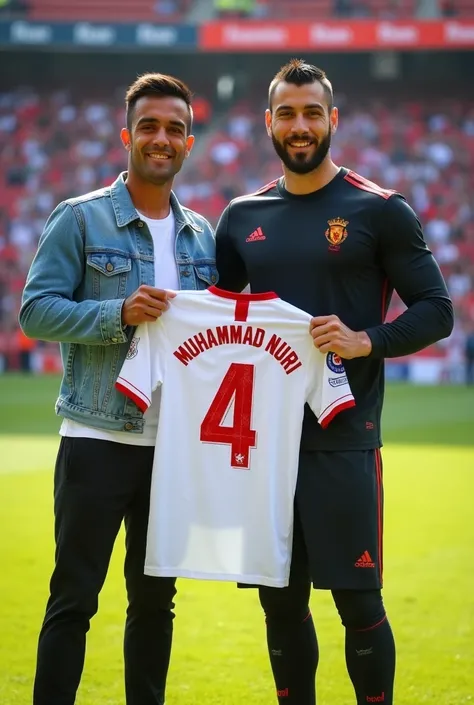 Photo of SERGIO RAMOS, Juventus footballer, next to an Indonesian man with neatly trimmed hair wearing a Denim Jacket, they are holding a football shirt that says"MUHAMMAD NURI" Number 4. He is standing on the grass field. The background contains a stadium...