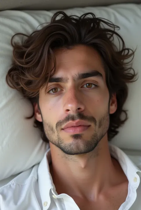 24 year old man,  brown white skin ,  medium length hair,  wavy hair ,  long hair , brown eyes,  slim body, hombros anchos,  white shirt , Lying down, in bed,  looking at the camera, natural,  Make him look young and without a beard
