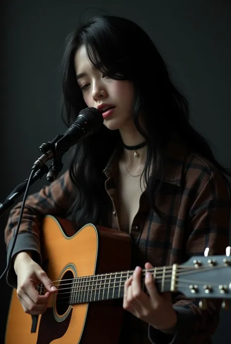  A young woman with long wavy black hair,  wearing a plaid shirt and choker necklace ,  is playing an acoustic guitar and is singing or recording music. The background is dark ,  highlighting the woman and her musical elements . The look on the face exudes...