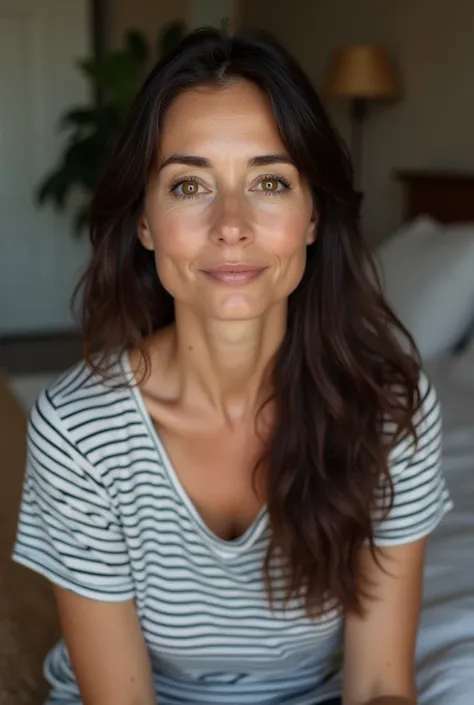 54-year-old woman with white skin brown eyes without wrinkles ,  long dark brown hair sitting in her bedroom wearing a striped shirt without any pants or skirts