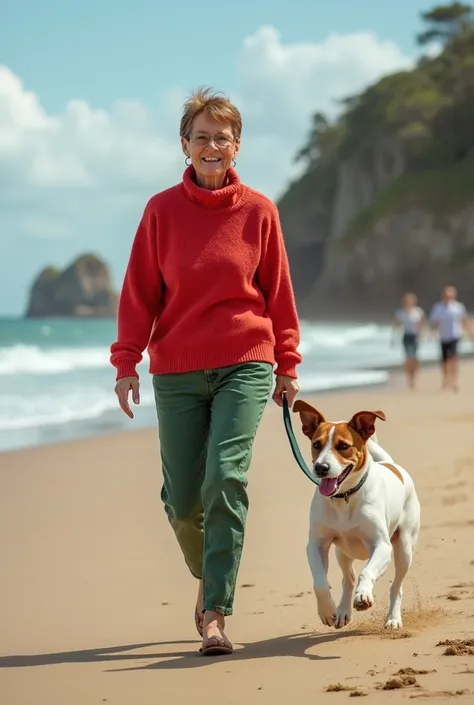 femme 60 ans, légèrement bronzée cheveux châtains courts coupés au carré, jeans verts, pull rouge, hyperactive. Elle tient un chiot Jack Russel en laisse sur une plage de sable des côtes bretonnes