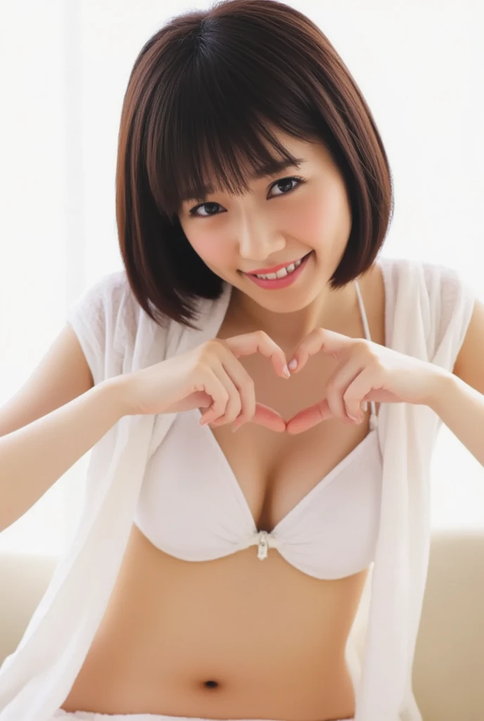 A smiling woman is posing alone wearing off-the-shoulder pajamas, making a firm big heart shape with both hands, and holding them in front of her chest, View above collarbone、The background is a monotone 、
