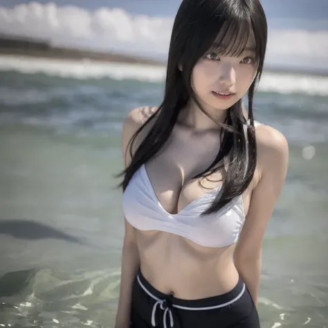 Japanese woman posing while soaking in the ocean up to her waist