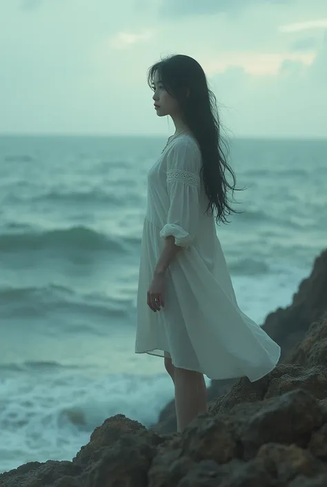 A sad beautiful girl by the sea