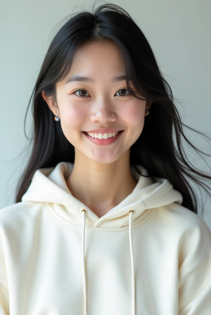 give me a picture of an 18 year old asian girl wearing a white hoodie smiling.