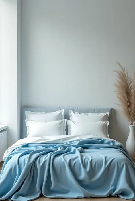 Bed with a light blue blanket