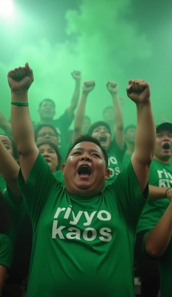 Cinematic video of Persebaya ultras giving support to their team, slightly fat supporters wearing green T-shirts with the text "RIYOYO KAOS" with clean faces shouting enthusiastically in support of their team, in the stadium stands full of green smoke