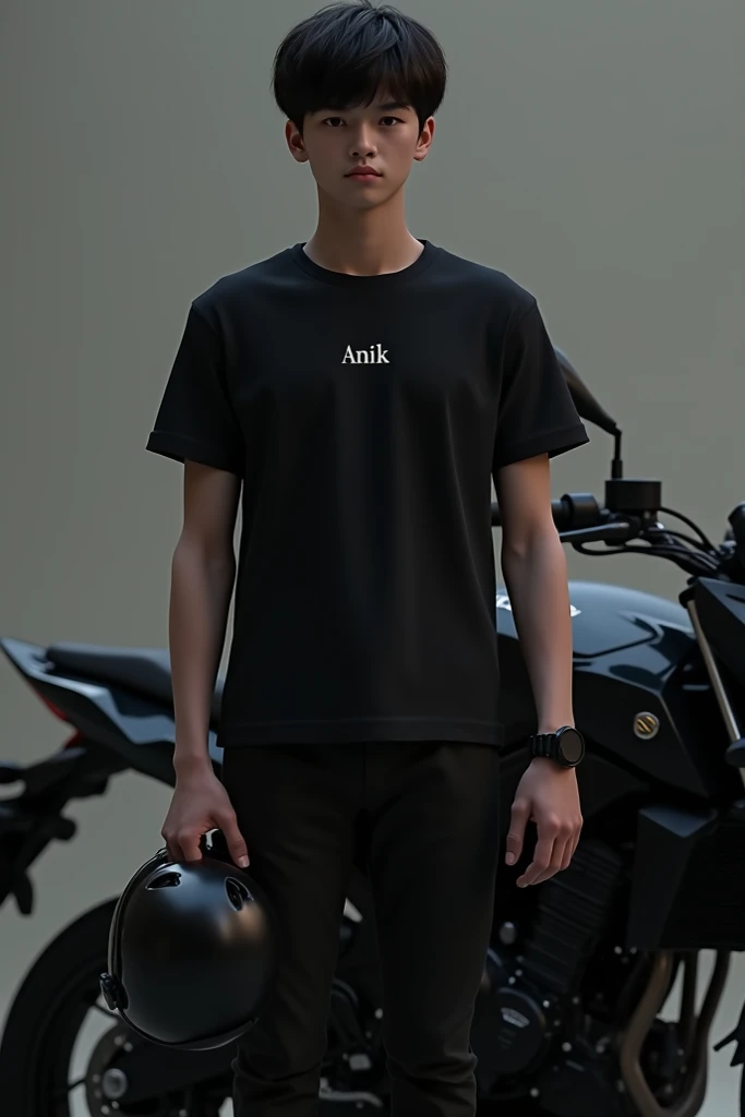 A boy wearing a black T-shirt is standing next to a black Suzuki Gixxer Monotone, wearing a black watch in and holding a helmet . The name "ANIK" is written on the T-shirt.

