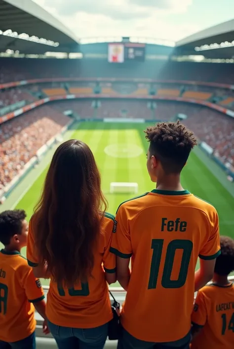 A woman and a man looking forward with two ren at the MRV Arena stadium watching a soccer game and all wearing the Atlético Mineiro jersey, Fefe is written on the womans blouse and on the mans he .the woman has brown hair, seeds, far away, Brunette and a c...